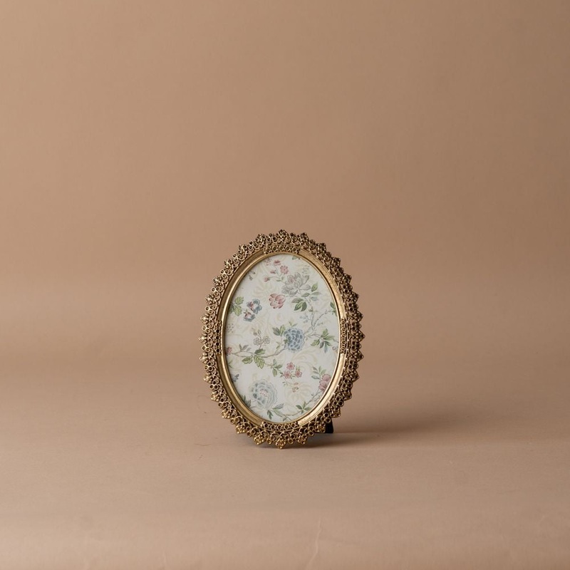 Antiqued Oval Floral Frame