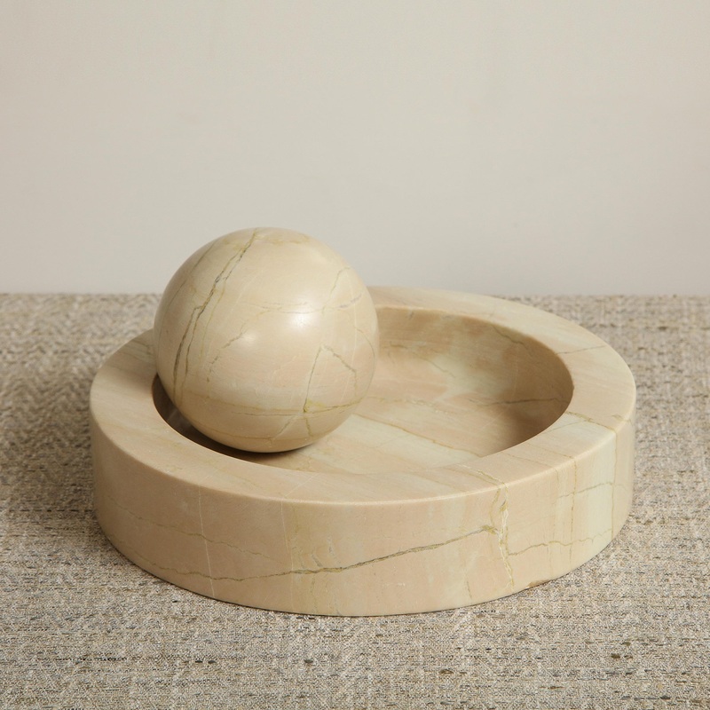 Atlas Sphere & Stone bowl in coral by Thomas O’Brien