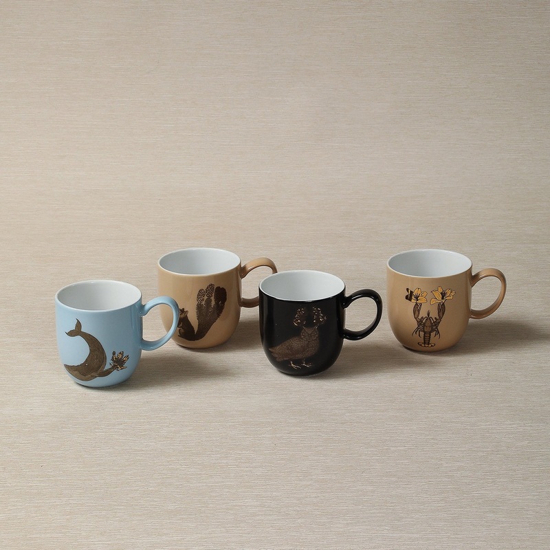 Gold animal motif mug