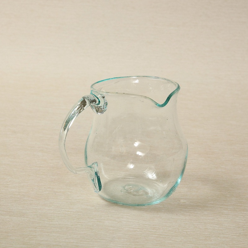 Handblown small glass pitcher