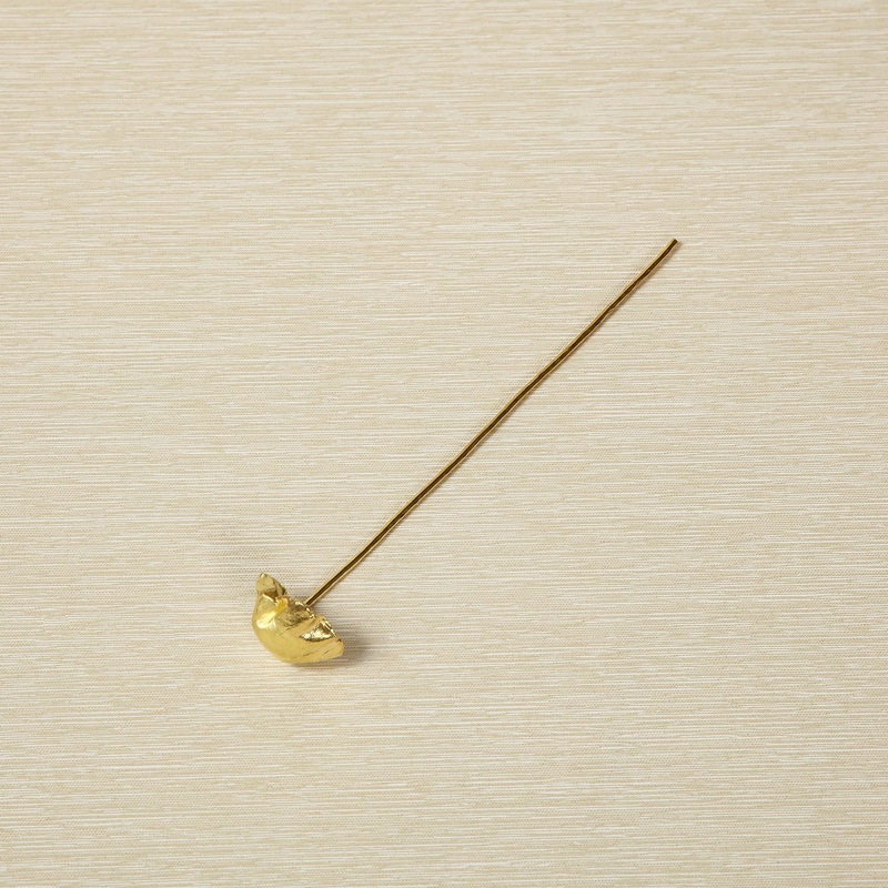 Cast brass cocktail spoon