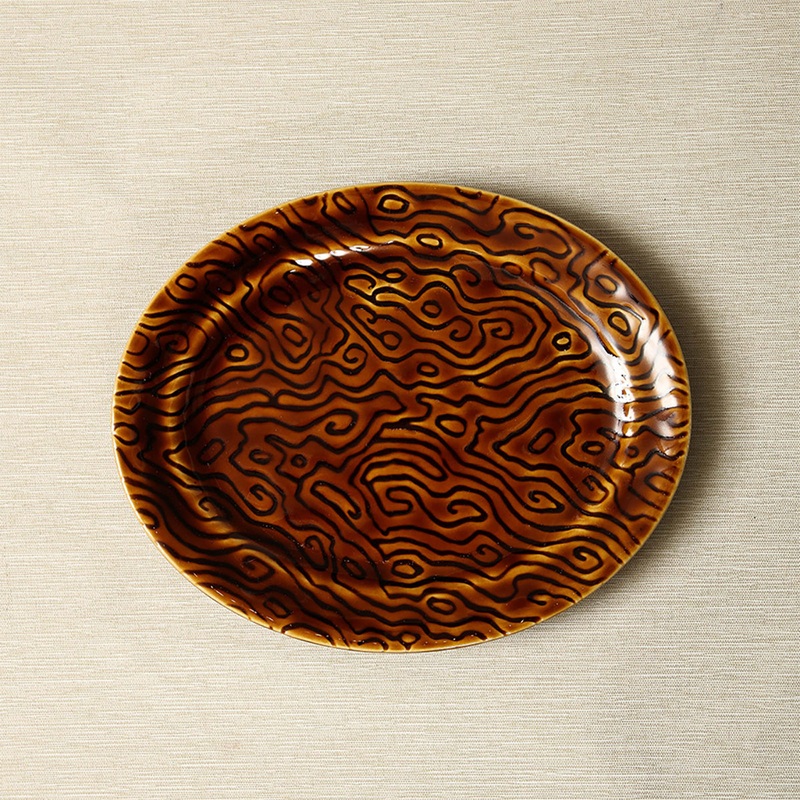 Chesa textured oval plate in honey